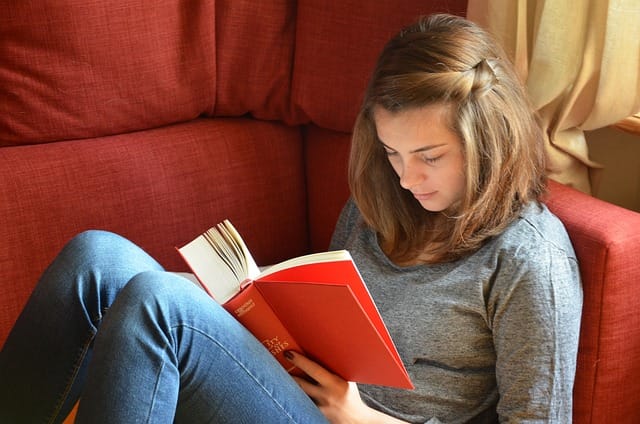 Teenager Reading A Book